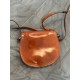 Brown Leather Saddle Crossbody Bag with Flap Closure and Strap